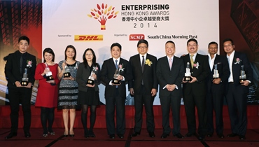 (From L) Winners Jonathan UNG of Drop-Shipping Global Services Ltd, Rendy Ng of Bee's Diamonds, Anita Lee, 4M Industrial Development Ltd, Fanny Fan of Ultra Active Technology Ltd, Stanley Wong of Chuan Chiong Co.Ltd, Robin Hu, CEO of SCMP Group, Ken Lee, Executive Vice President, Commercial, Asia Pacific, Managing Director, Hong Kong and Macau of DHL Express, Herman Lo, Fu Hong Industries Ltd, Girish Jhunjhnuwala of Ovolo Hotel and Alan Lim of E-Services Group Ltd, pose during the Enterprising Hong Kong Awards at Admiralty.  25SEP14